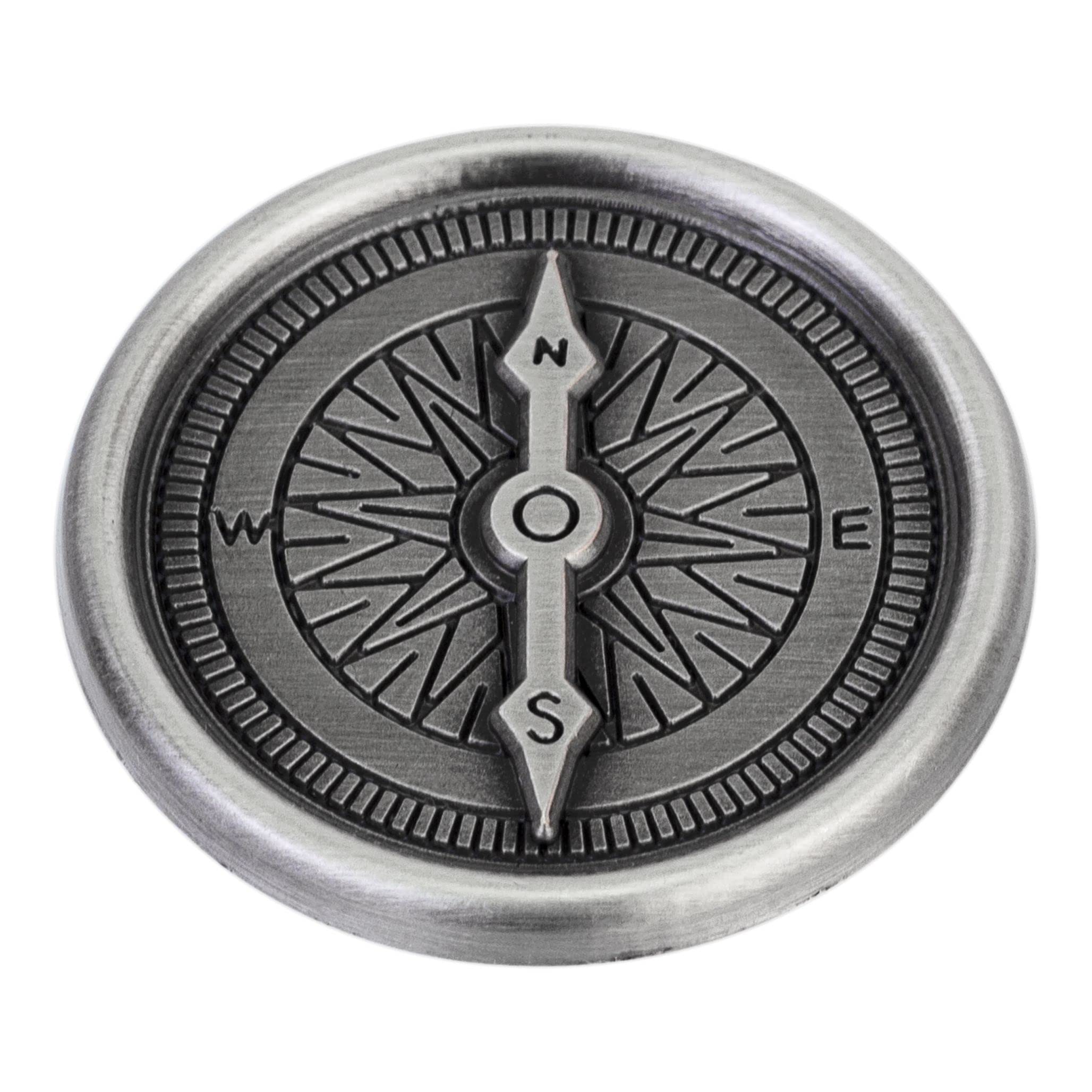 Compass travel token with 'Stay safe on your travels' message on reverse