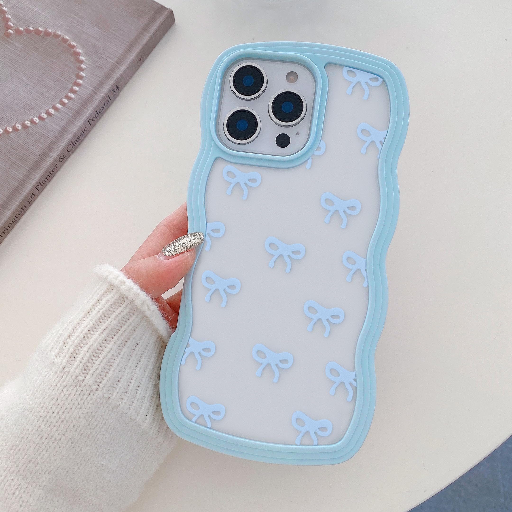 Photo 1 of QLTYPRI Bow Case for iPhone 16 Pro, Clear Cute Ribbon Bow Phone Case Curly Wavy Aesthetic Phone Case, Slim Soft Transparent Shockproof Protective Cover for Women Girls - Blue