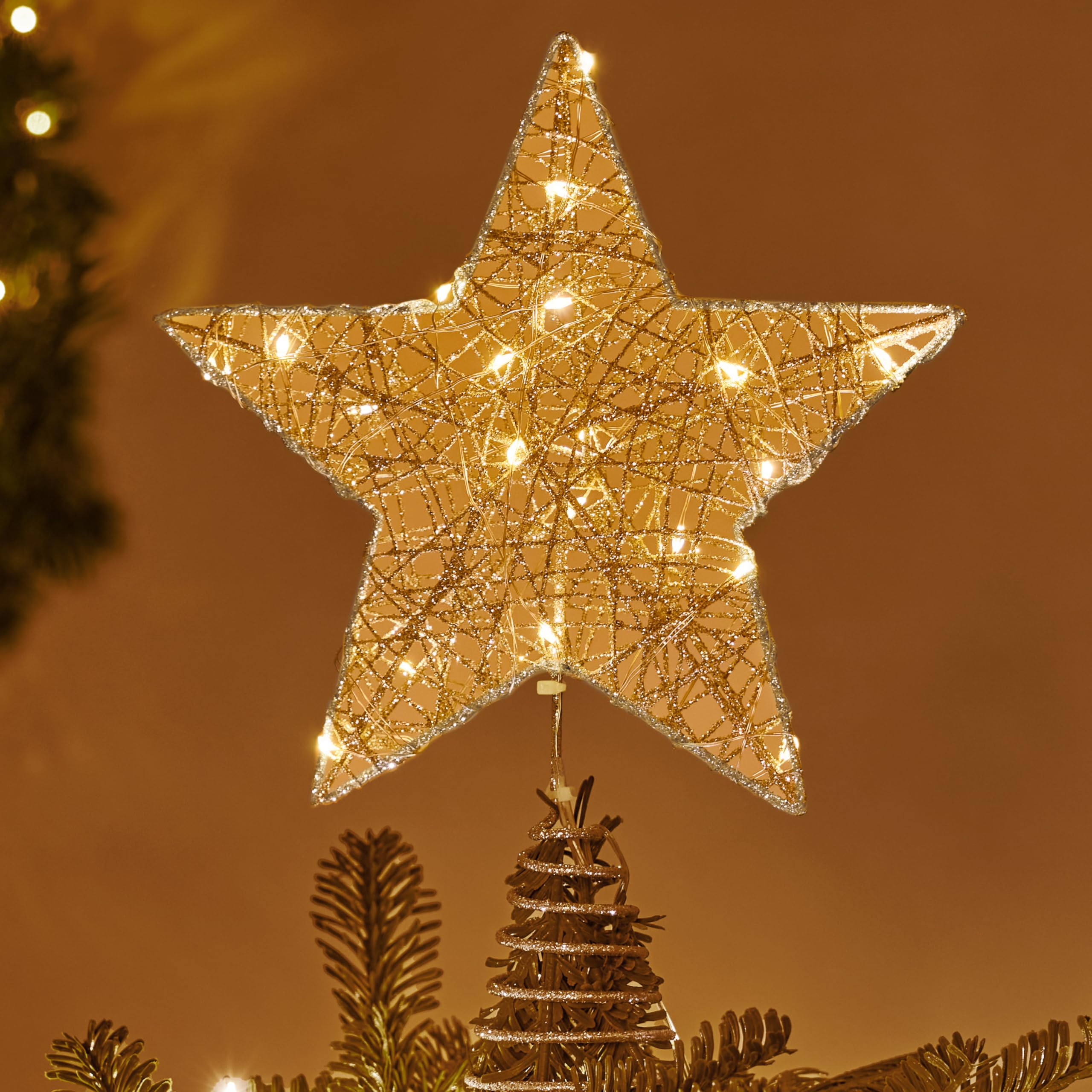 Photo 1 of Joiedomi 8 inch Christmas Glitter Star Tree Toppers, Battery Powered Metal Silver Star Lighted with LED Warm White Lights for Xmas Decorations, Holiday Party Indoor Decor