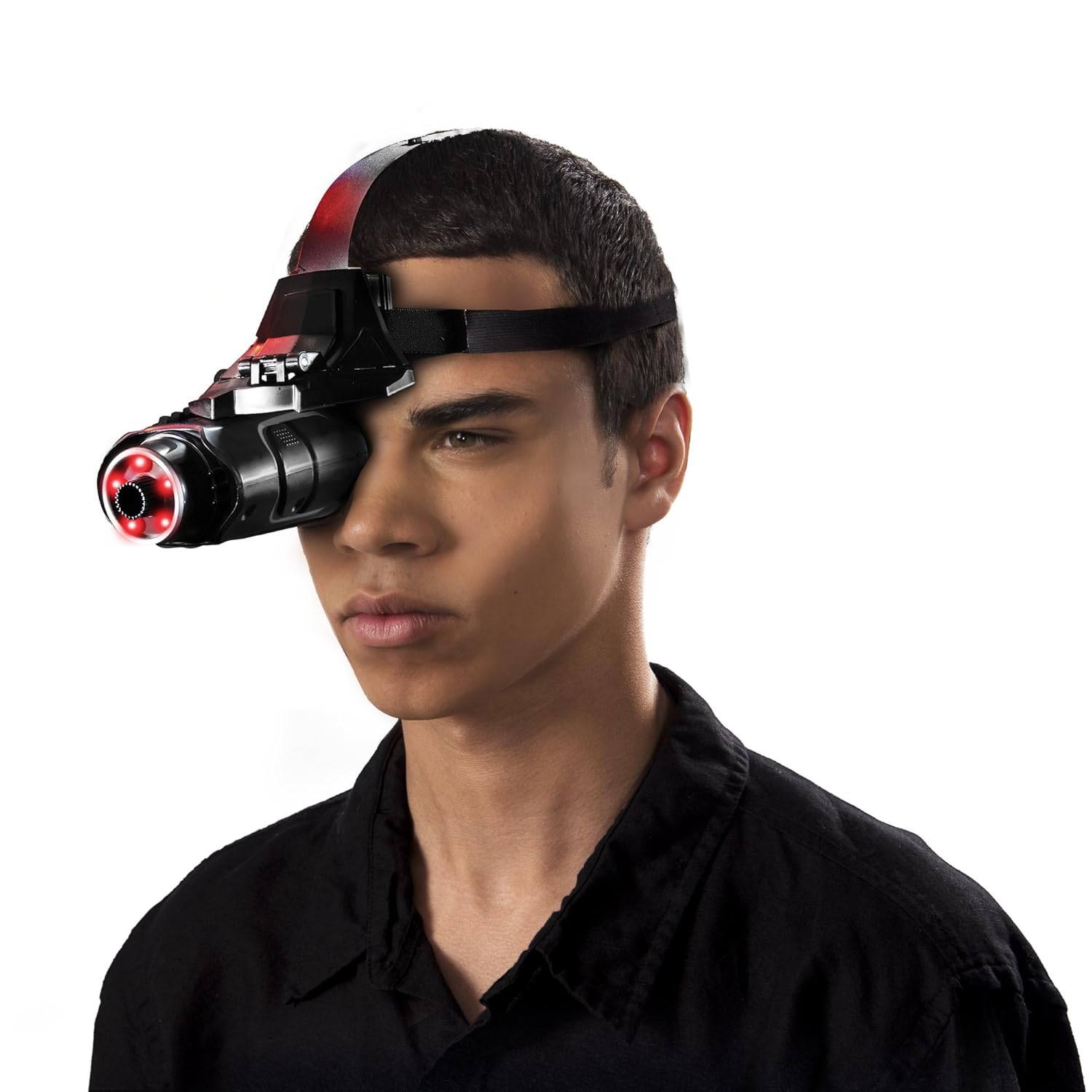 Image shows a younger teen wearing a spy vision device on one eye. It has red lights and goes over his head. 