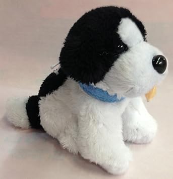 peluche perro blanco y negro
