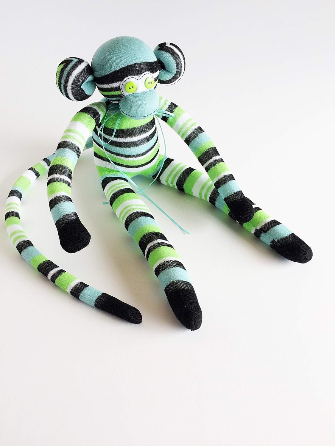 green stuffed monkey