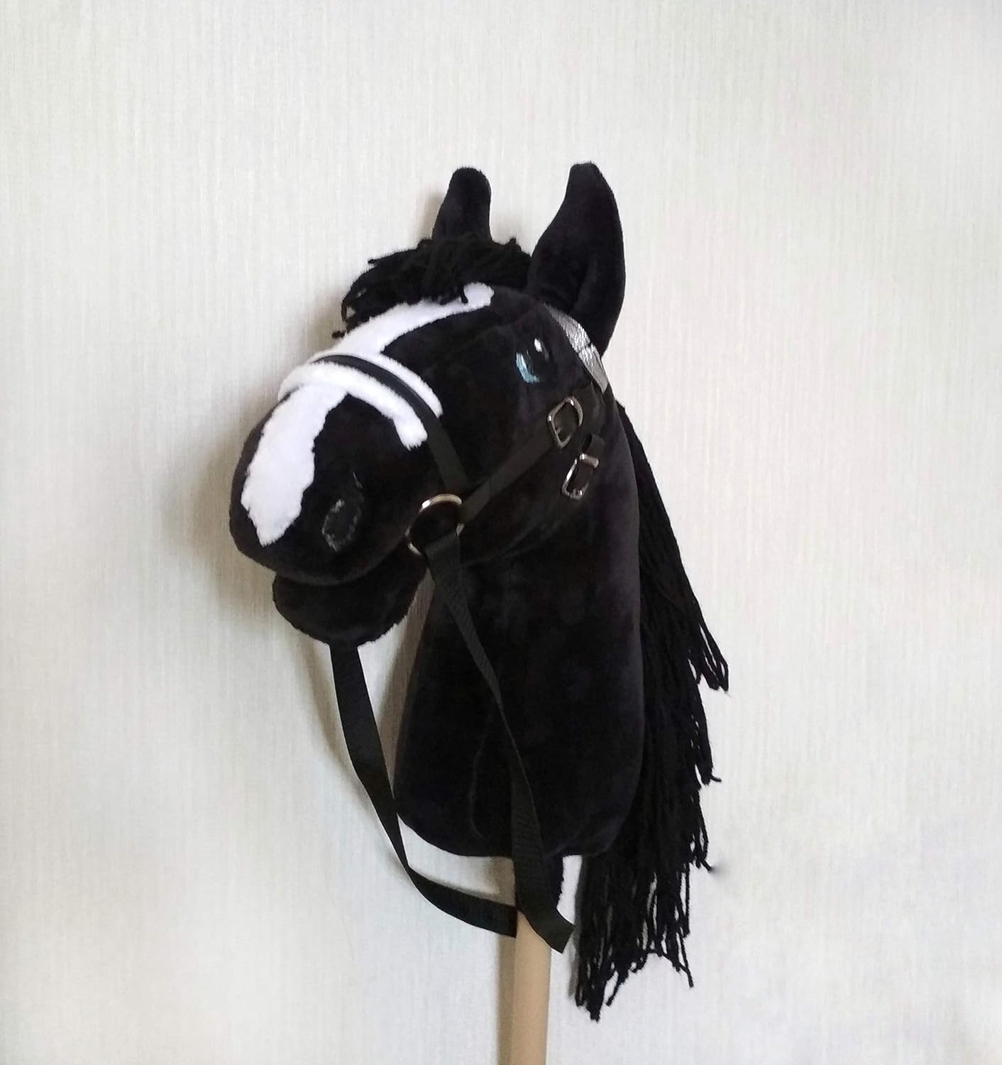 black stick horse