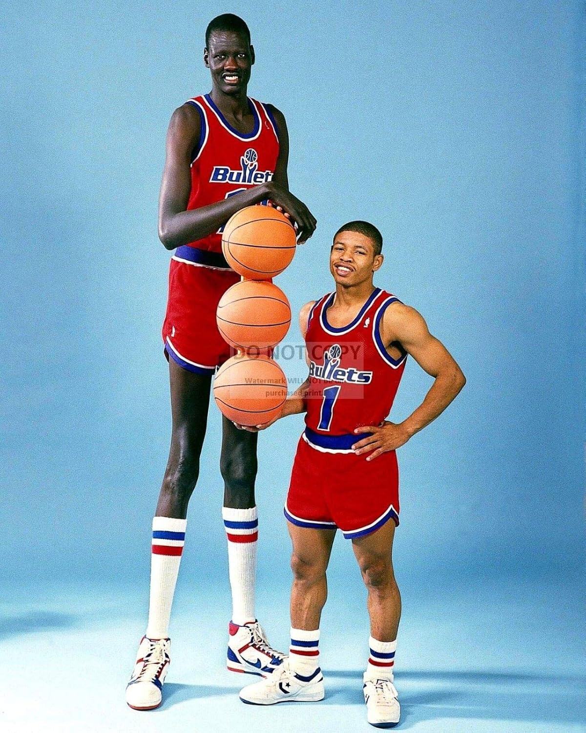bucraft MANUTE BOL and MUGGSY BOGUES 