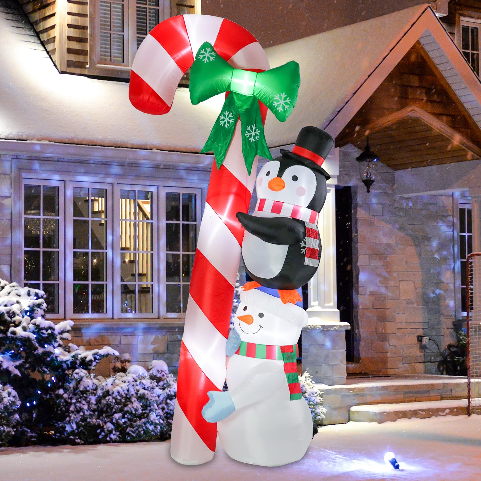 Photo 1 of Vipush 8.9 FT Christmas Inflatable Candy Cane Snowman Penguin with LED Lights for Christmas Decorations Blow Up Indoor Outdoor Yard Lawn Holiday Garden Decorations