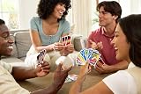 Mattel UNO Card Game with 2 Add-On Packs in Collectible Tin view 2