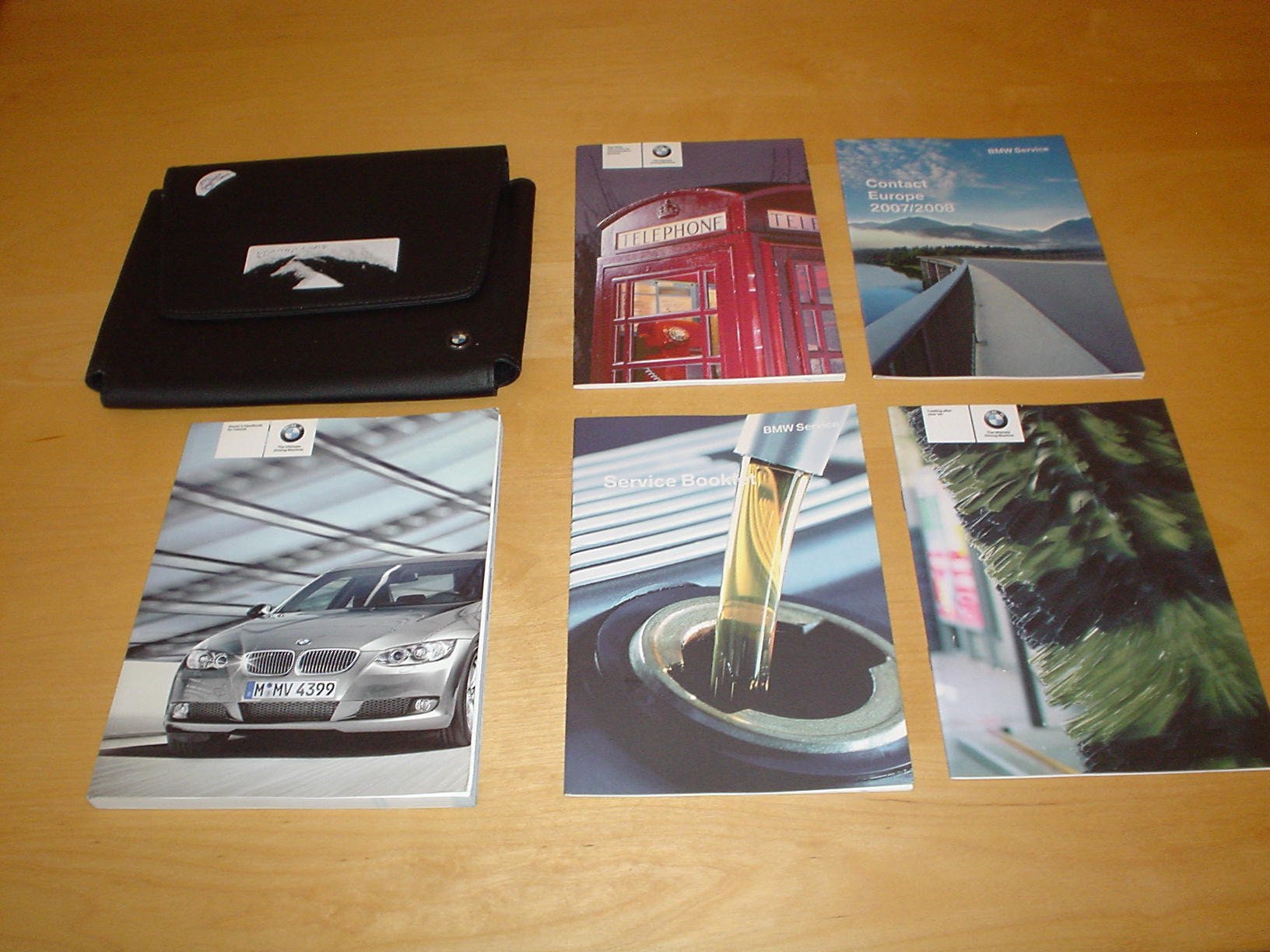 BMW IDRIVE E92 & E93 3 SERIES iDrive OWNERS HANDBOOK c/w WALLET (2005 -  2011) COUPE & CONVERTIBLE - 320i 325i 325xi 330i 330xi 335i 320d 325d 330d  330xd ...