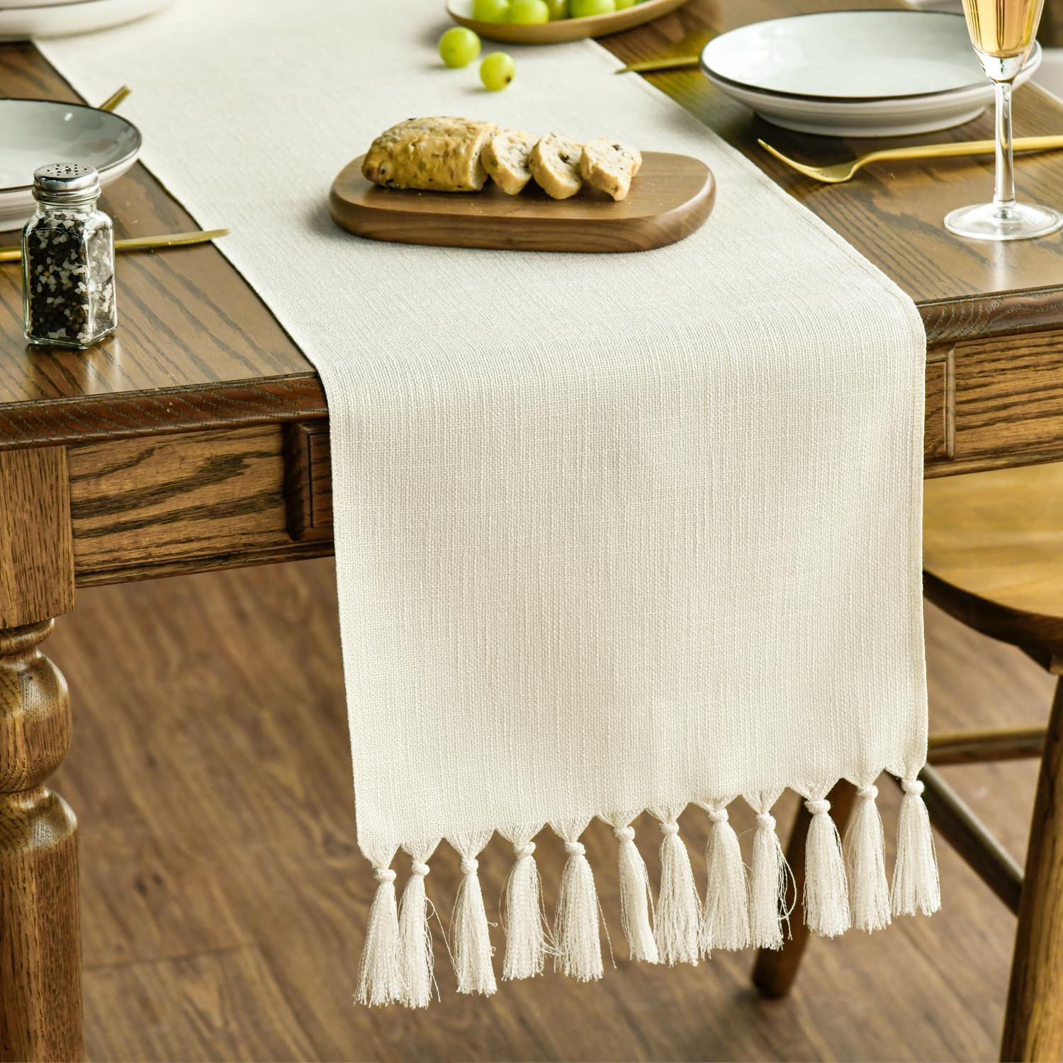 Photo 1 of Artoid Mode Beige Tassel Table Runner, Boho Linen Blend Rustic Farmhouse Style Kitchen Table Decoration Holiday Wedding Party Dinning Decor 13x90 Inch