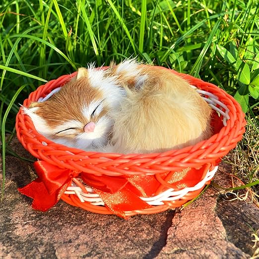 sleeping cat in basket toy