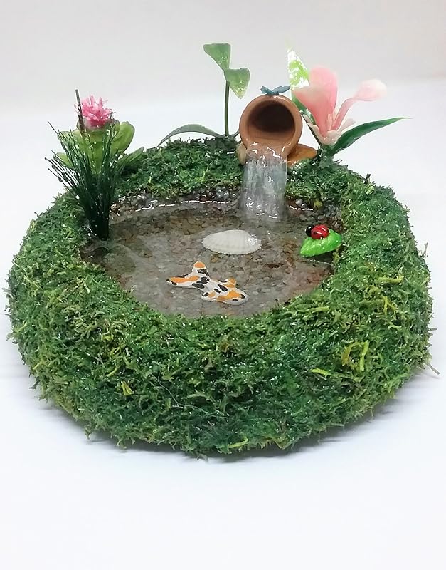 Fairy garden miniature koi fish pond with waterfall. Handmade