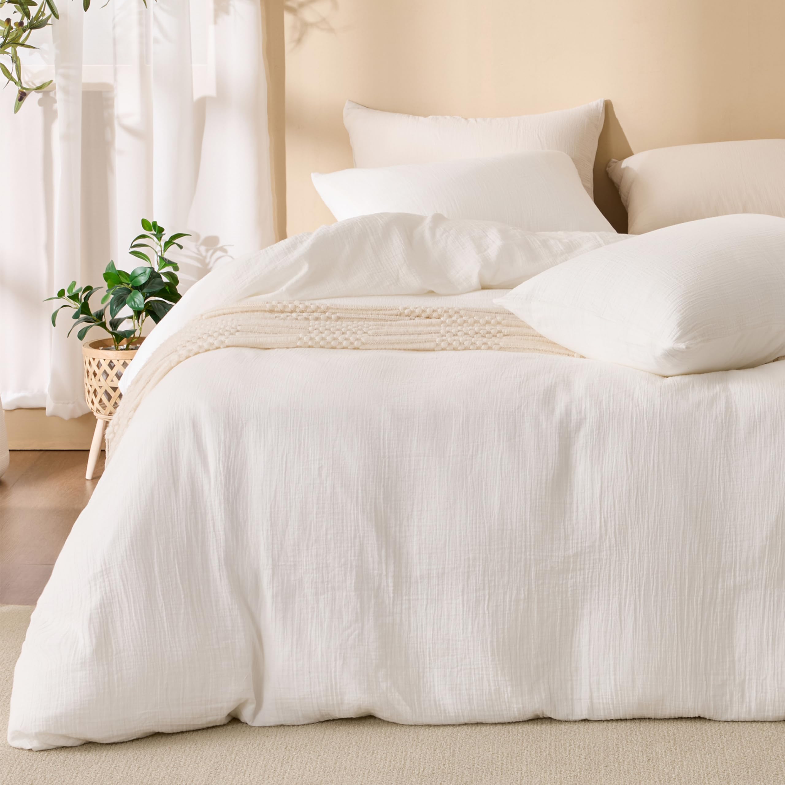 Photo 1 of RENEWROOTS Off White Duvet Cover King, 100% Sandwashed Cotton Soft King Size Duvet Cover Set 3 Pieces with Zipper Clousre & Corner Buttons (Off White, King 104 x 90)