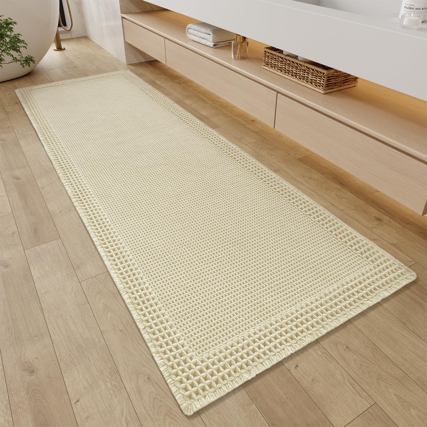 Photo 1 of RESARE Waffle Bathroom Runner Rugs, Super Absorbent Bath Mat Non Slip Washable Quick Dry, Ultra Soft Quick Dry Boho Bath Rugs with Tassels for Hallway Bedroom Laundry Room, 2'x6'(24"x72") Cream