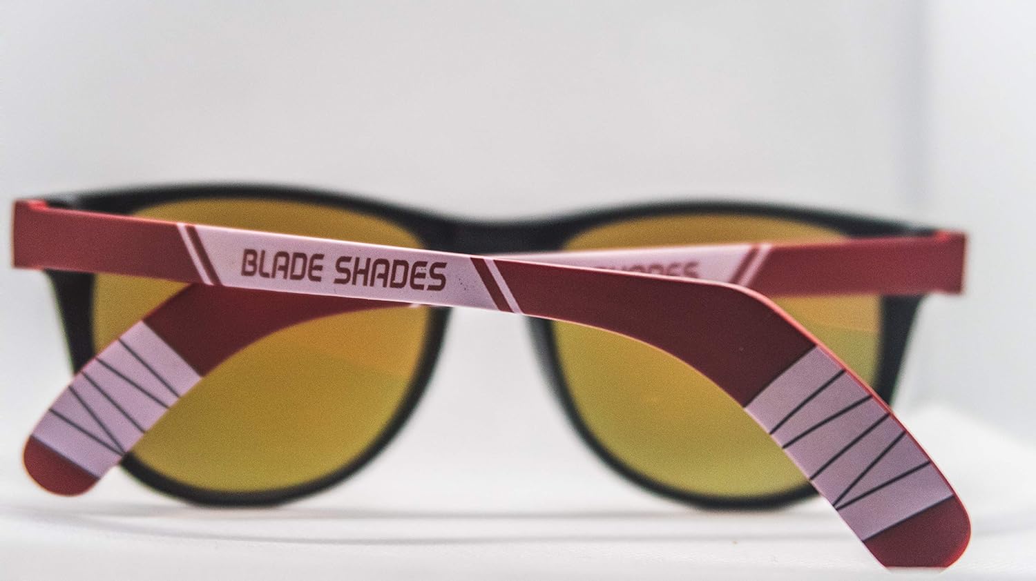 Blade Shades Hockey Stick Sunglasses - Original - 100% UV Protection, Fun Sunglasses for Players and Fans (Red/Black Frame, Red Mirror Lens): Clothing