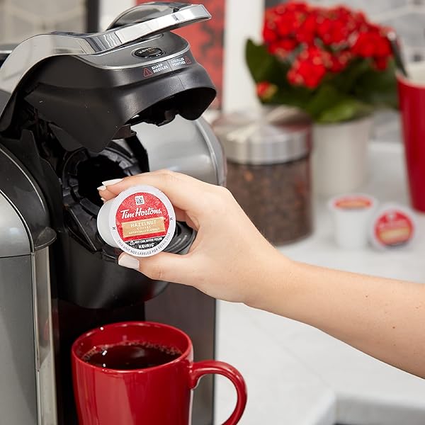 TIM HORTONS HAZELNUT FLAVORED, MEDIUM ROAST COFFEE, SINGLE-SERVE K-CUP PODS COMPATIBLE WITH KEURIG BREWERS, 12CT K-CUPS, RED