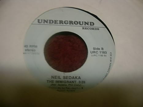 Neil Sedaka Neil Sedaka 7 45 Laughter In The Rain The Immigrant Amazon Com Music Harbors open their doors to the young searching foreigner come to live in the light of the big l of liberty plains and open skies, bill boards would advertise was it anything like that when you arrived? amazon com
