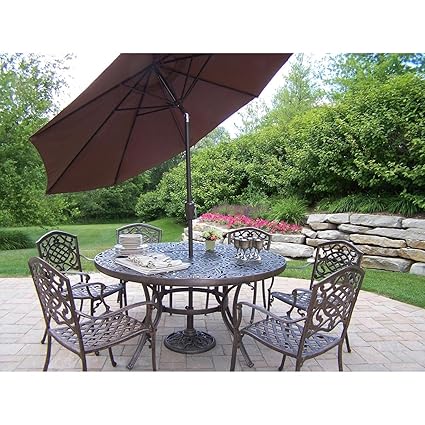 Oakland Living Mississippi Cast Aluminum 60 Inch Table With 6 Stackable Chairs 7 Piece Dining Set Plus 9 Feet Tilting Umbrella And Stand