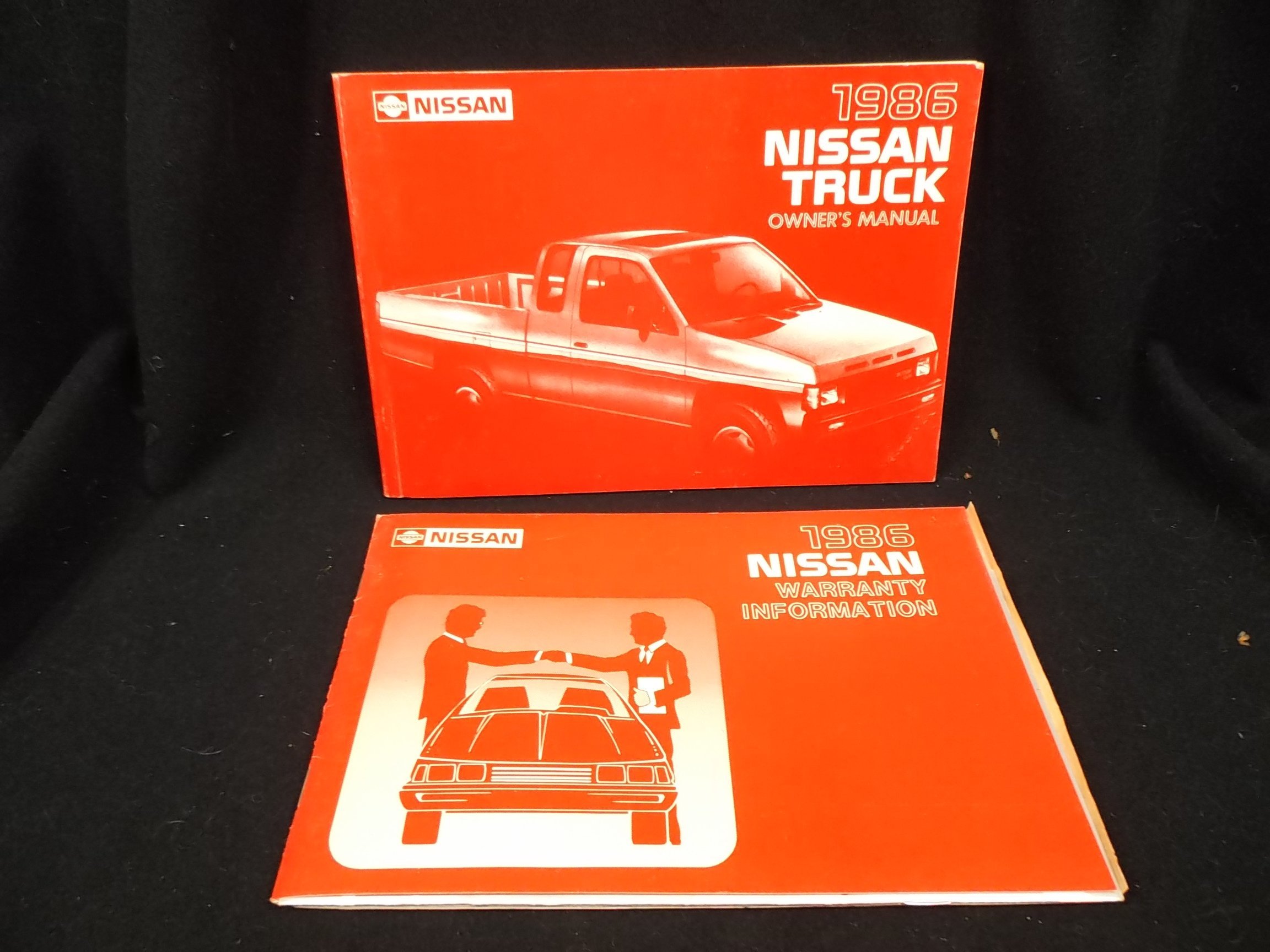 1986 Nissan Truck D21 Series Owners Manual Paperback – 1986