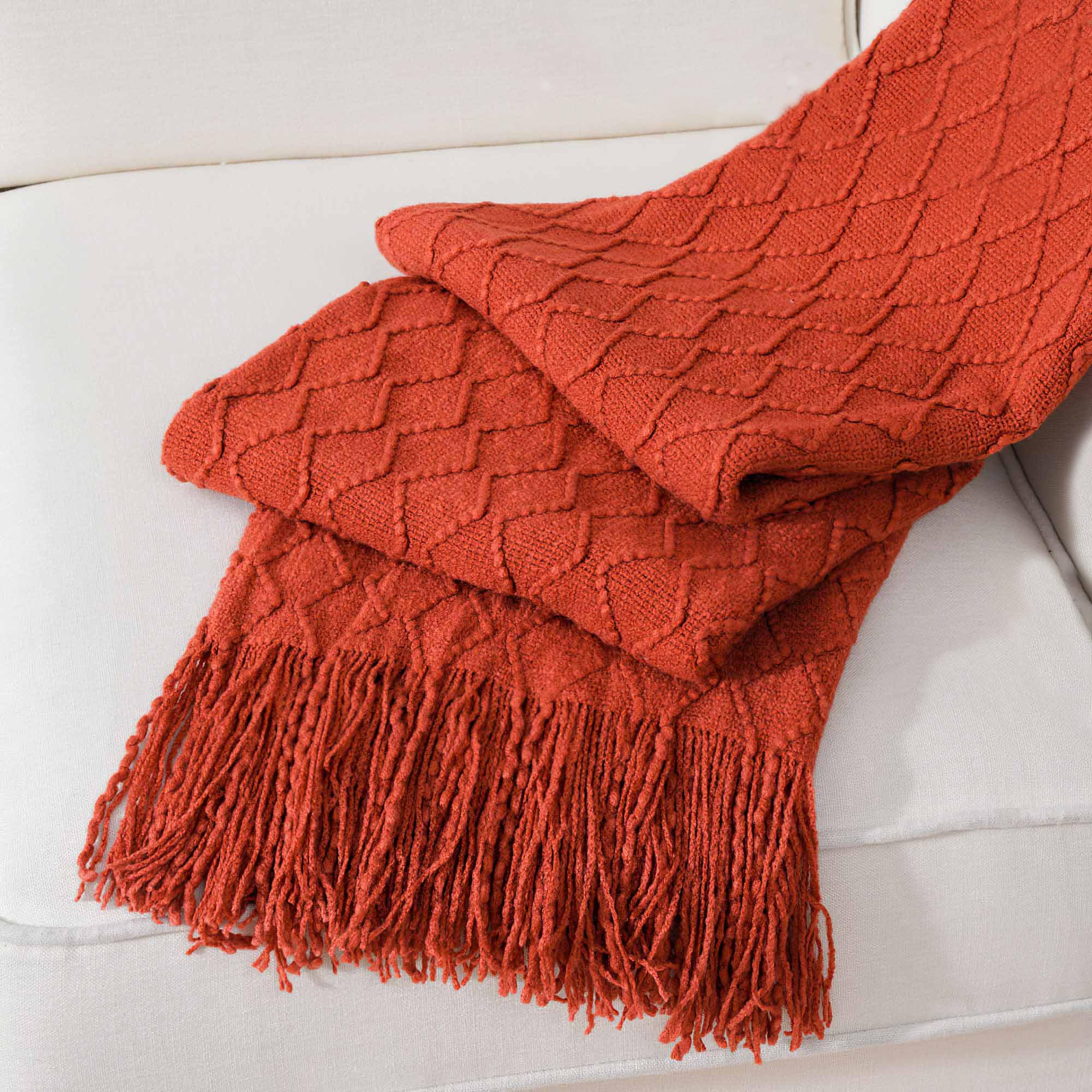 Photo 1 of BATTILO HOME Rust Throw Blanket for Couch, 50" x 60", Acrylic Knit Woven Summer Blanket, Lightweight Decorative Soft Nap Throw with Tassel for Chair Bed Sofa Travel Picnic, Suitable for All Seasons