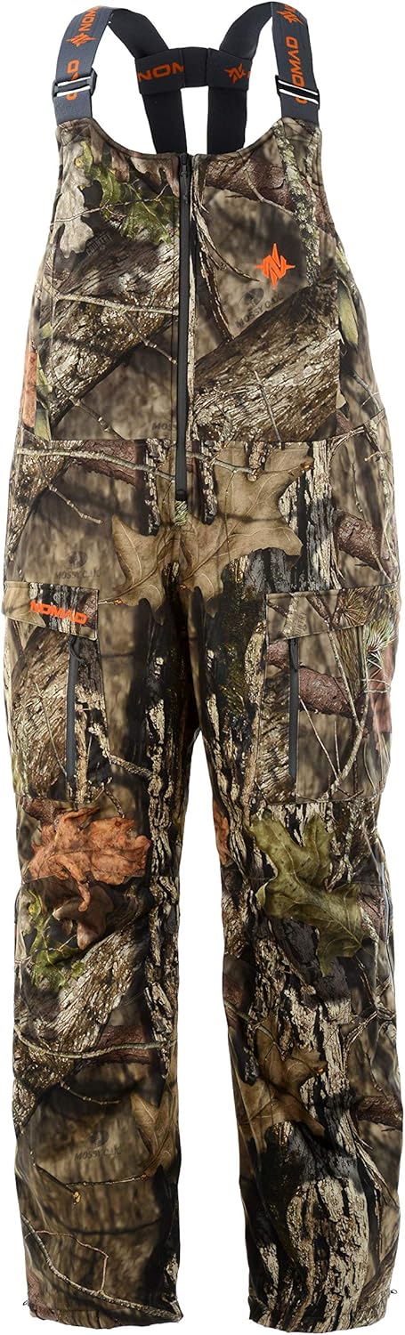 Nomad Mens Conifer Bib | Waterproof & Wind-Resistant Performance Camo Hunting Bib: Clothing