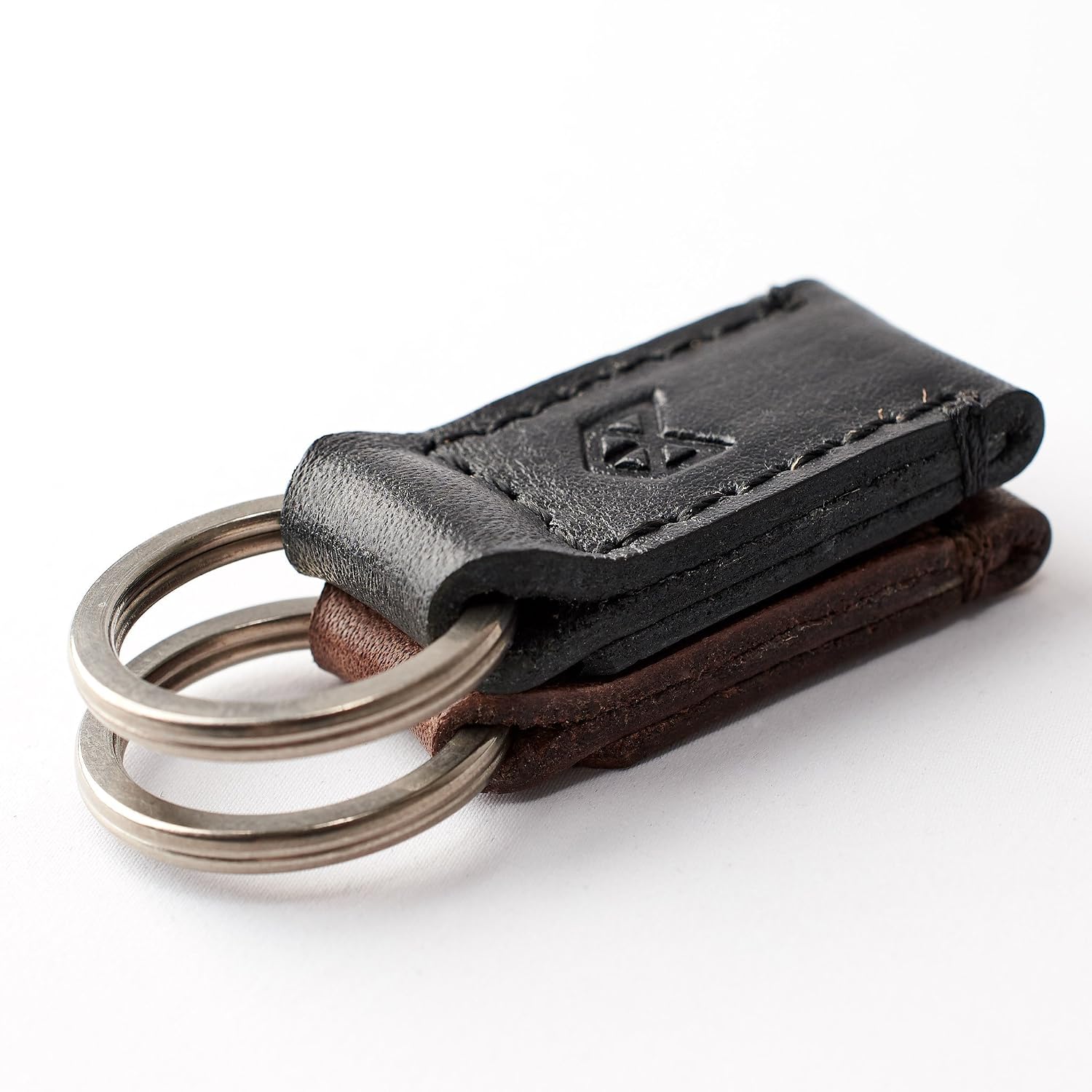 Black magnetic keychain. Leather keys 