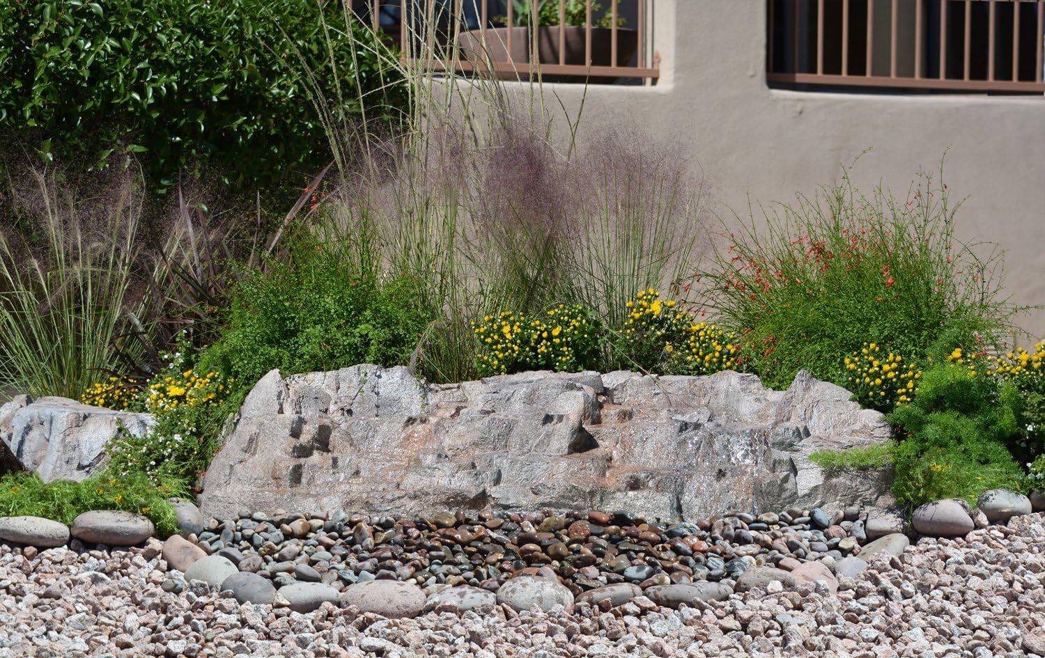 Outdoor Waterfall Fountain With Complete Disappearing Pondless Water Kit and Artificial Rock Waterfall, SlumberRock by EasyFalls in Sahara Brown Color