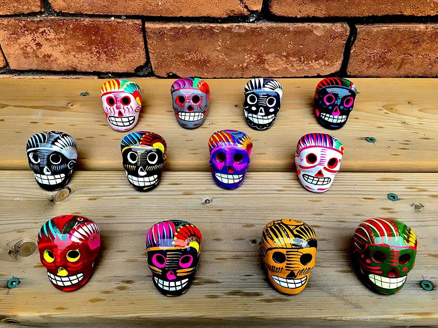 Assortment of Small Ceramic Sugar skull figurines, Five Count