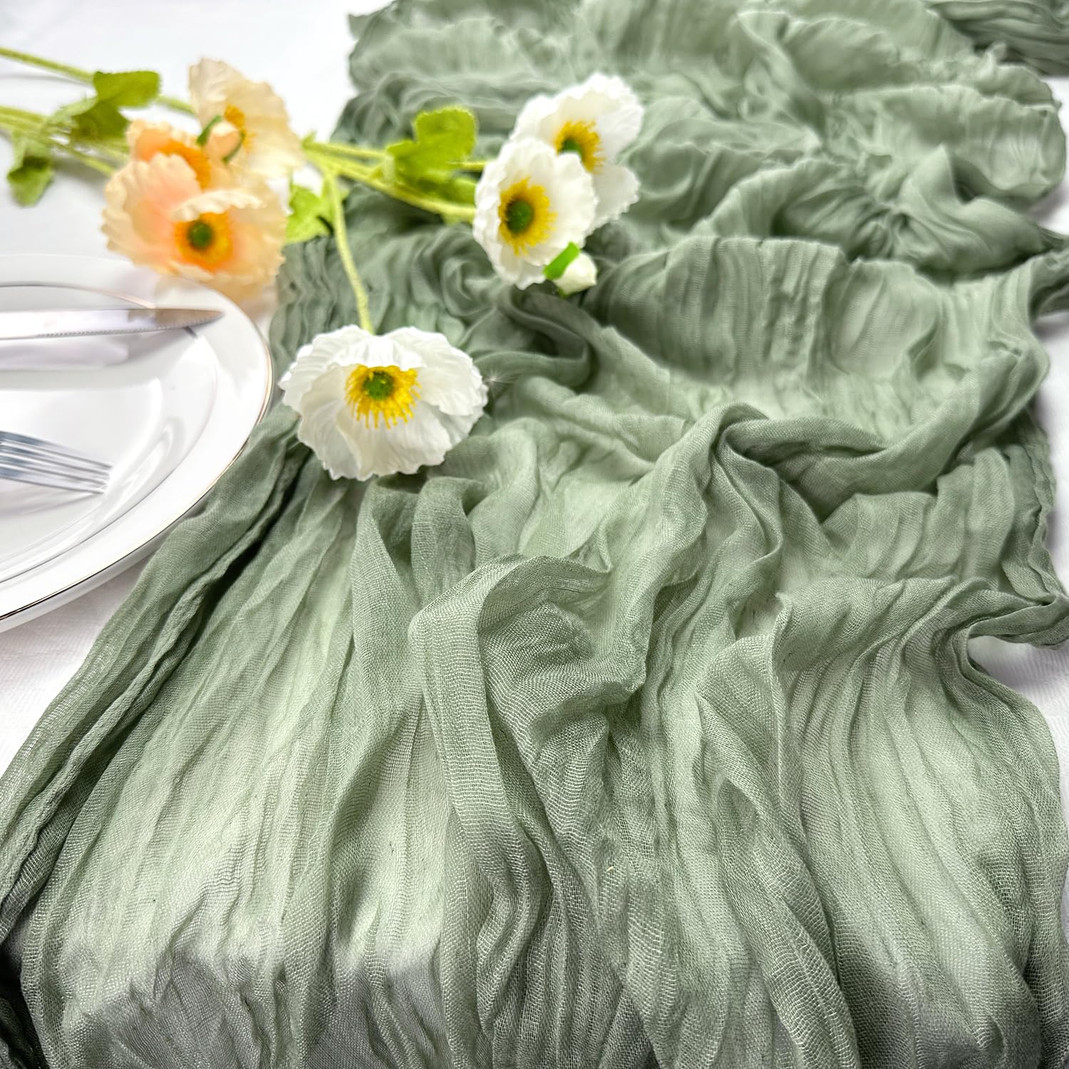 Photo 1 of Booque Valley 6 Pack Sage Green Cheesecloth Table Runner 10ft Super Soft Boho Wrinkled Gauze Sheer Cloth for Baby Shower Baptism Birthday Party Wedding Centerpiece Table Decoration, 35x120 Inch