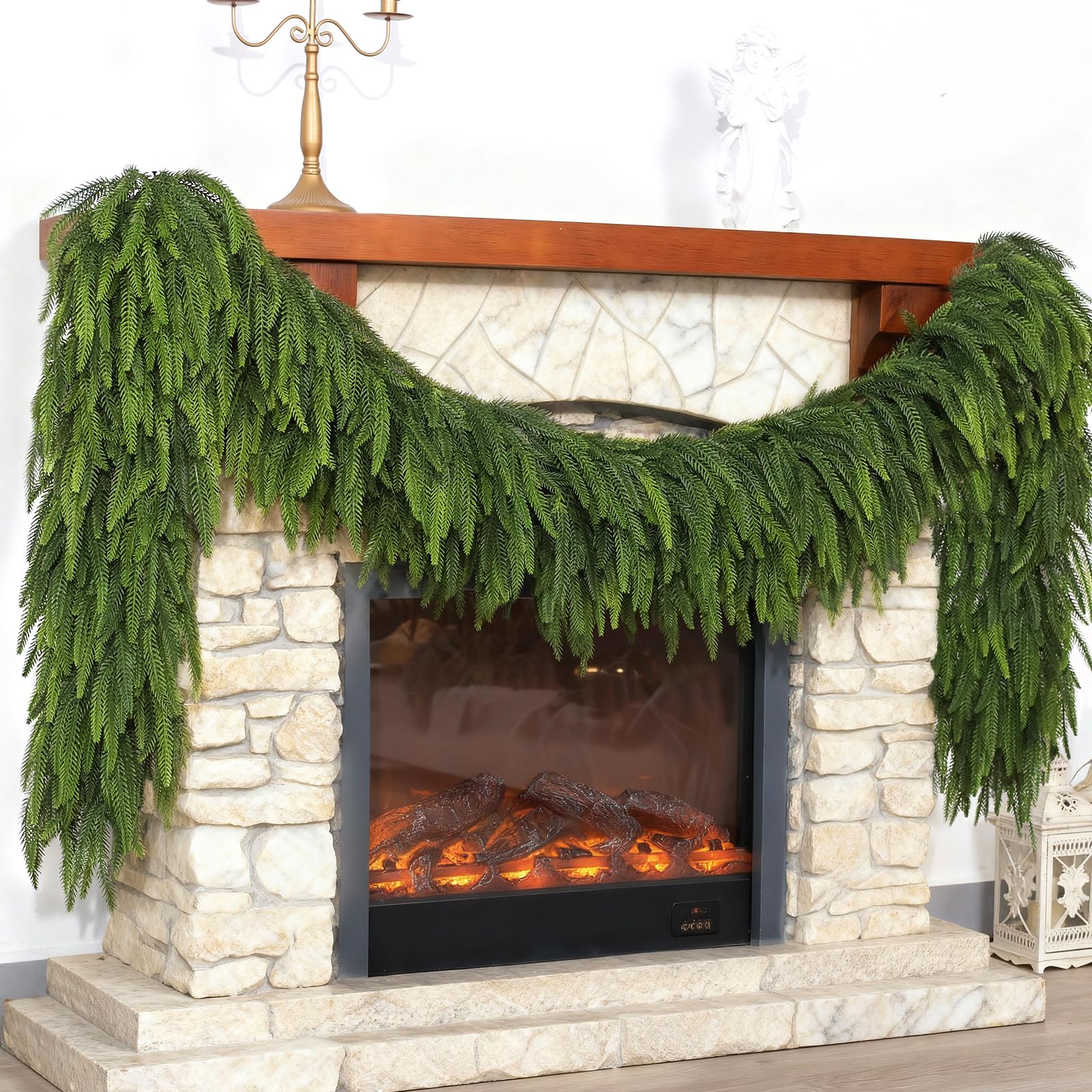 Photo 1 of Christmas Norfolk Pine Garlands - 9ft Artificial Garland Faux Green Fake Pine Needles Garland for Fireplace,Table,Window,Stairs,Mante,Holiday Indoor Outdoor Xmas Decor(2PCS)