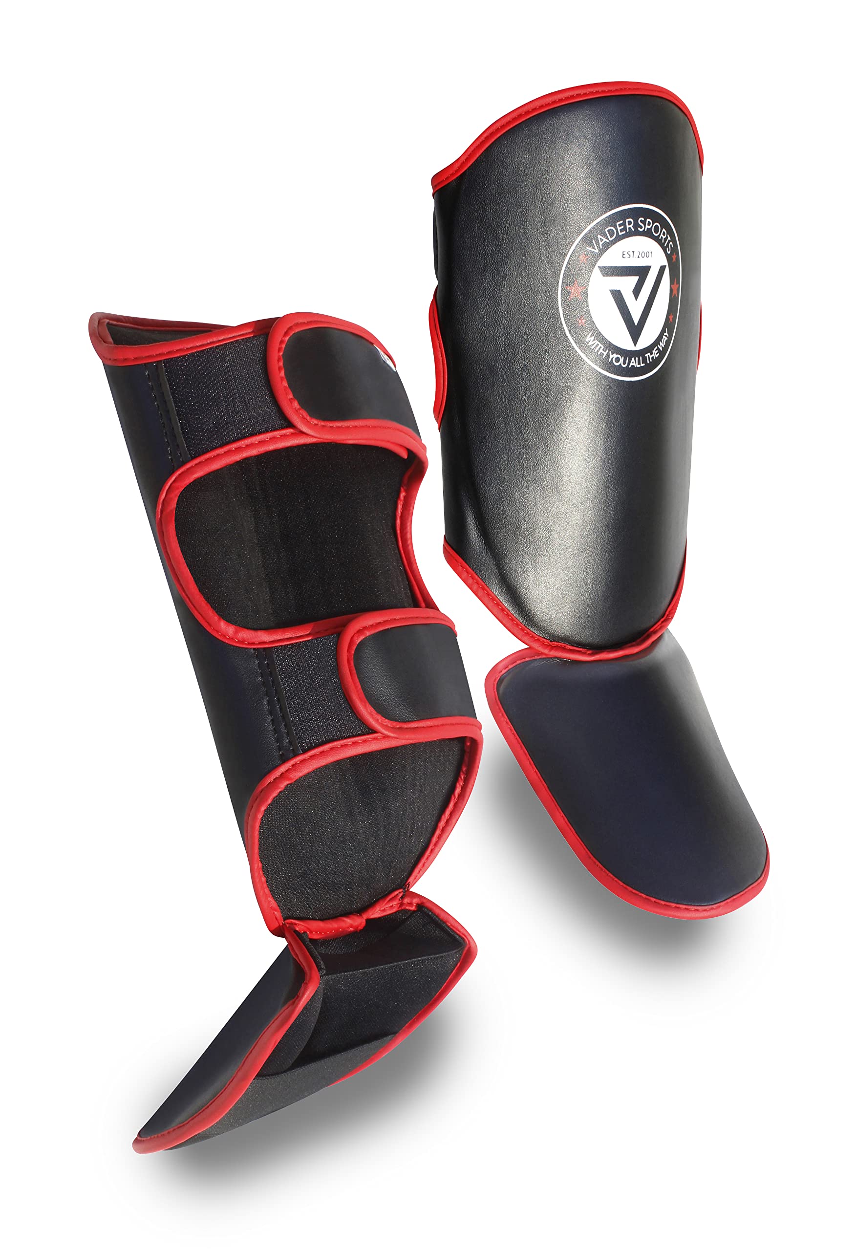Artificial leather thai boxing shin and instep pads. Adult black artificial leather thai boxing shin and instep pads. shin pads (Medium/ youth 12-14yrs)