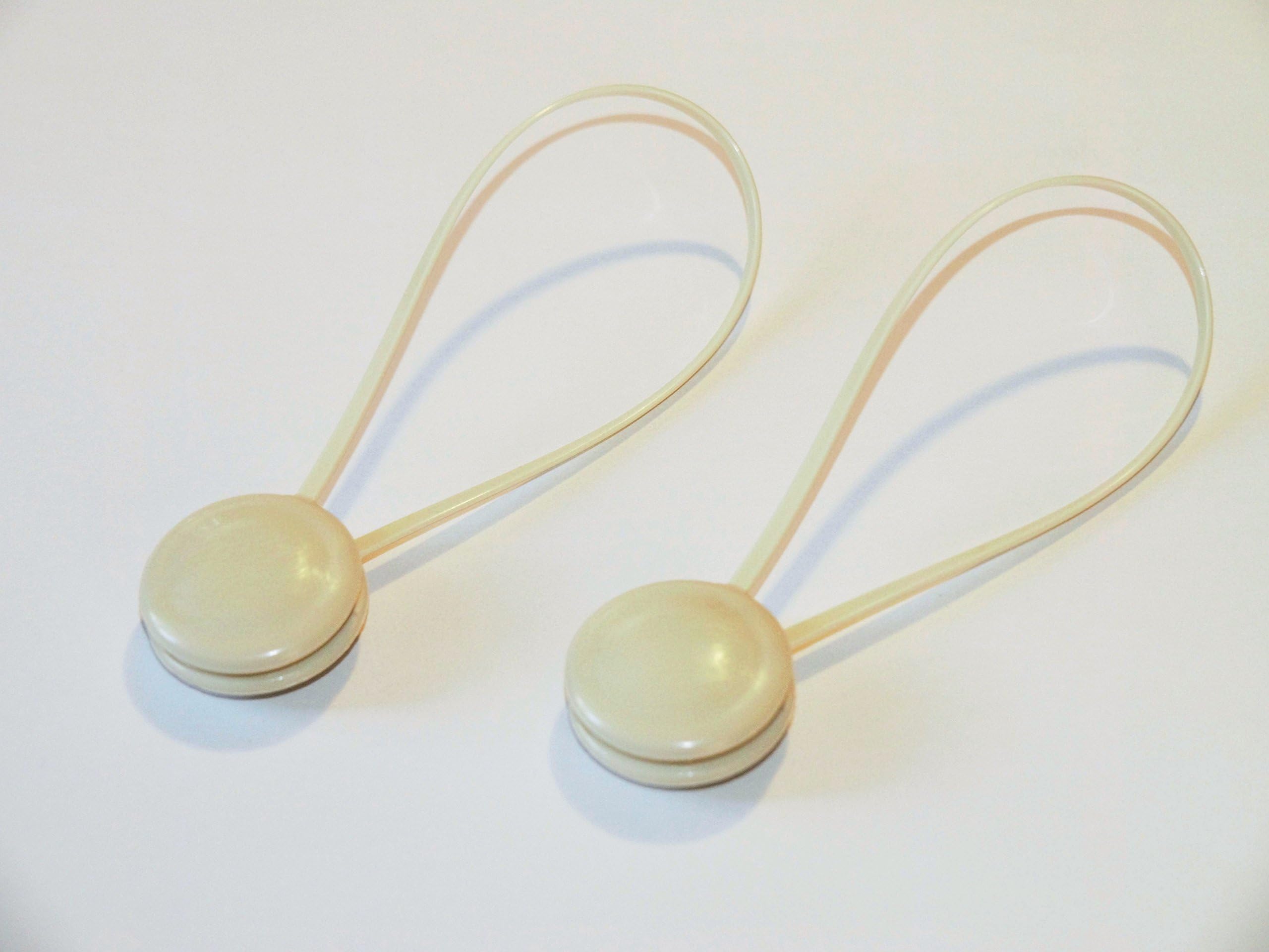 Decorative magnetic tie backs for curtains cream