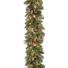 Photo 1 of National Tree Company 9 ft Pre-Lit Carolina Pine Artificial Christmas Garland, Christmas Decoration with Pinecones, 100 Clear Lights, 240 Tips, Green
