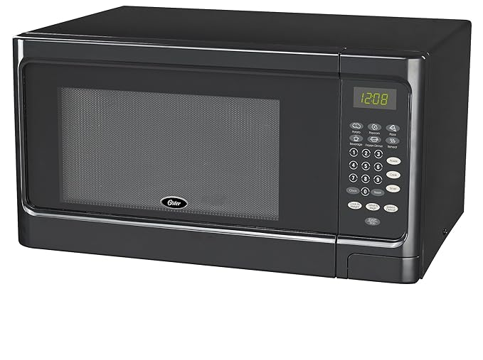 Oster OGCMS311BK-10 1.1 cu. Ft. Horno para microondas, color negro ...