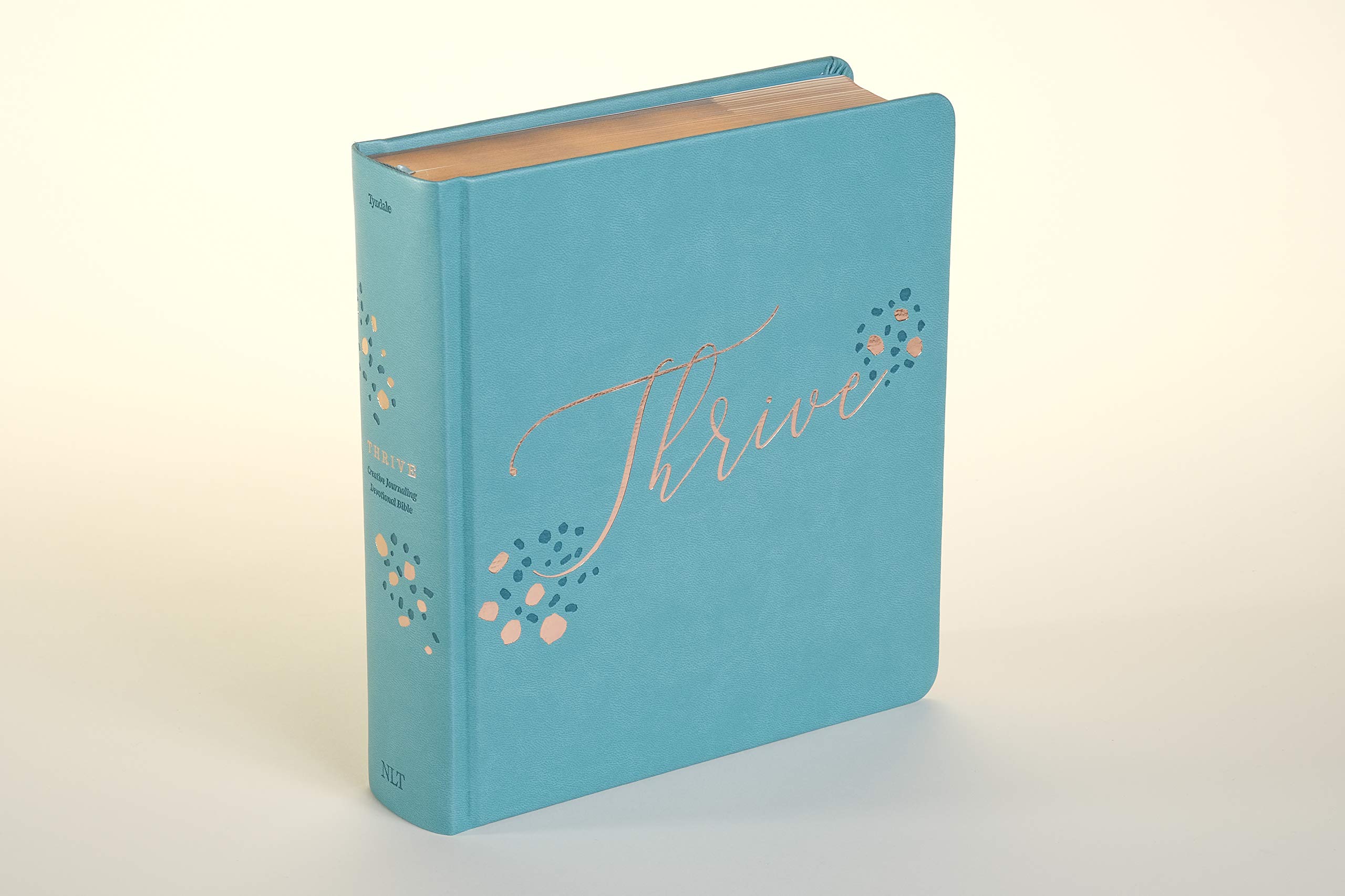 NLT THRIVE Creative Journaling Devotional Bible (Hardcover LeatherLike, Teal Blue with Rose Gold) NLT THRIVE Creative Journaling Devotional Bible (Hardcover LeatherLike, Teal Blue with Rose Gold) Imitation Leather