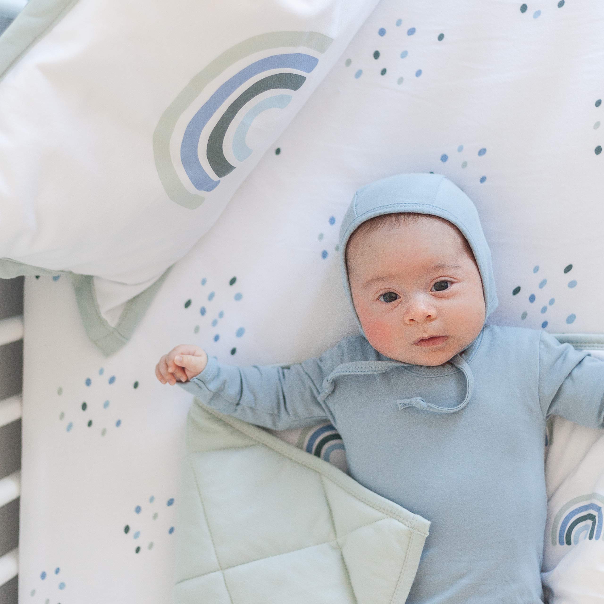 Ely's & Co. Baby Crib Bedding Sets for Boys and Girls — 4 Piece Set Includes Crib Sheet, Quilted Blanket, Crib Skirt, and Decorative Toddler (Blue Rainbow, 4 Piece)