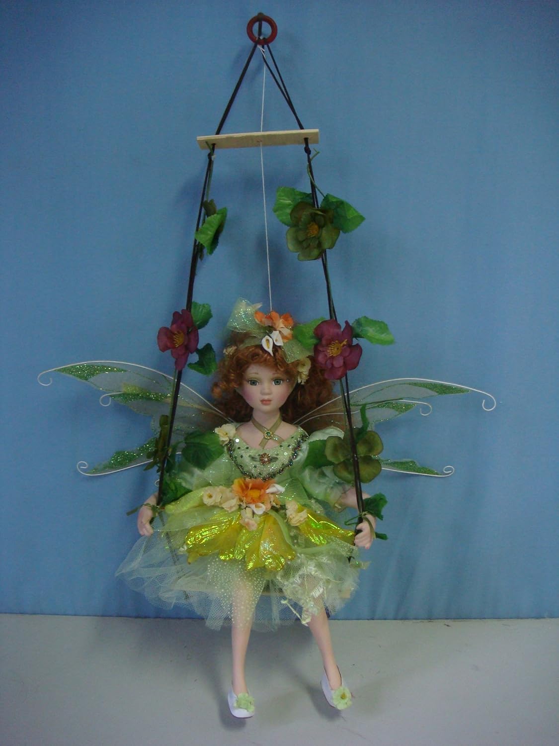 doll on a swing