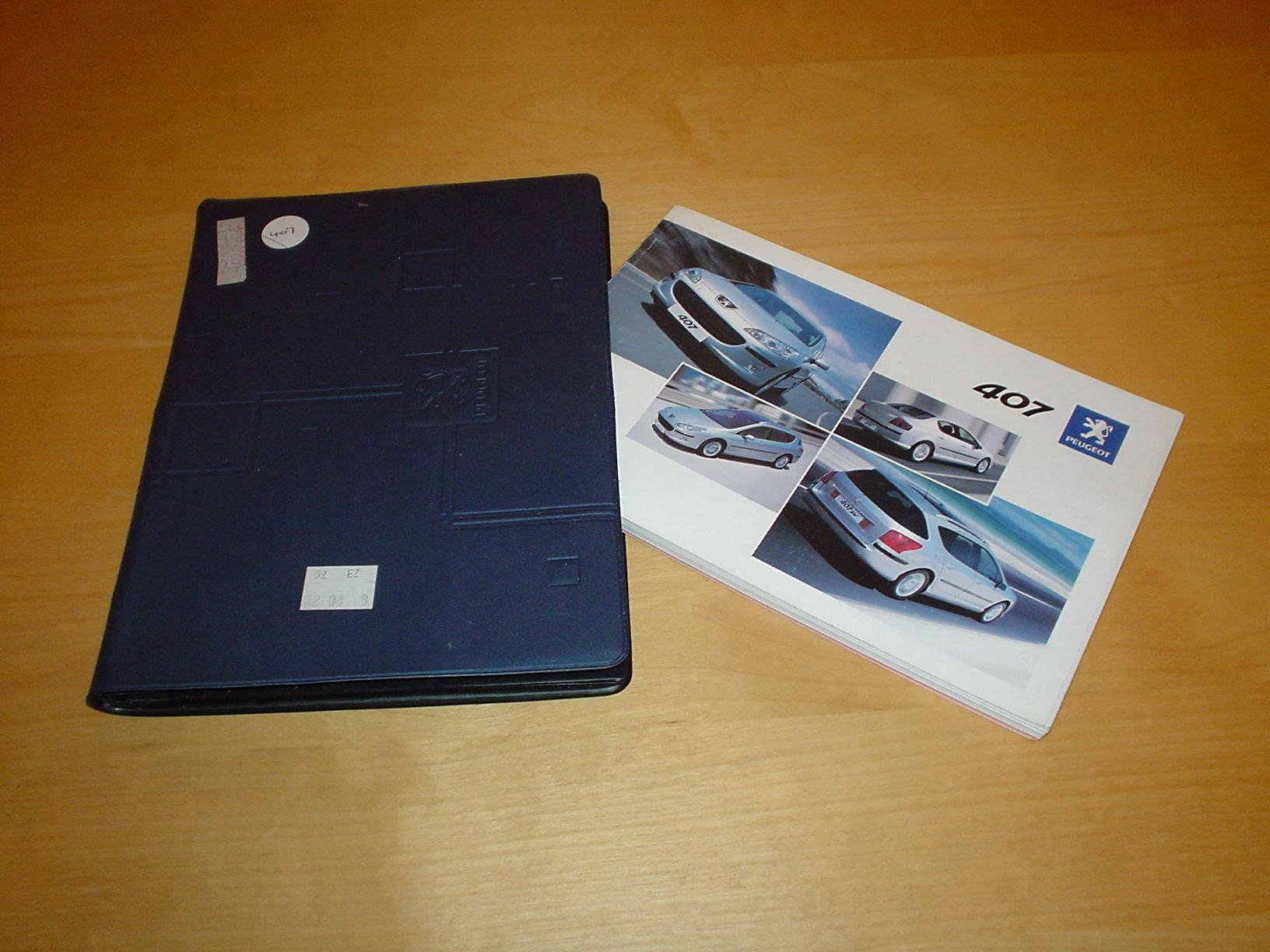 PEUGEOT 407 SALOON & SW OWNERS HANDBOOK c/w WALLET - 1.8 2.0 2.2 & 3.0  LITRE PETROL ENGINES 1.6 2.0 LITRE HDI DIESEL - OWNER'S HAND BOOK MANUAL  Paperback – ...