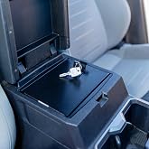 Tuffy Security Products Console Safe 423-01-A 2024-2026 Toyota Tacoma | pushbutton lock, welded steel construction, powder-coat finish, installs using factory mounting points, Black finish