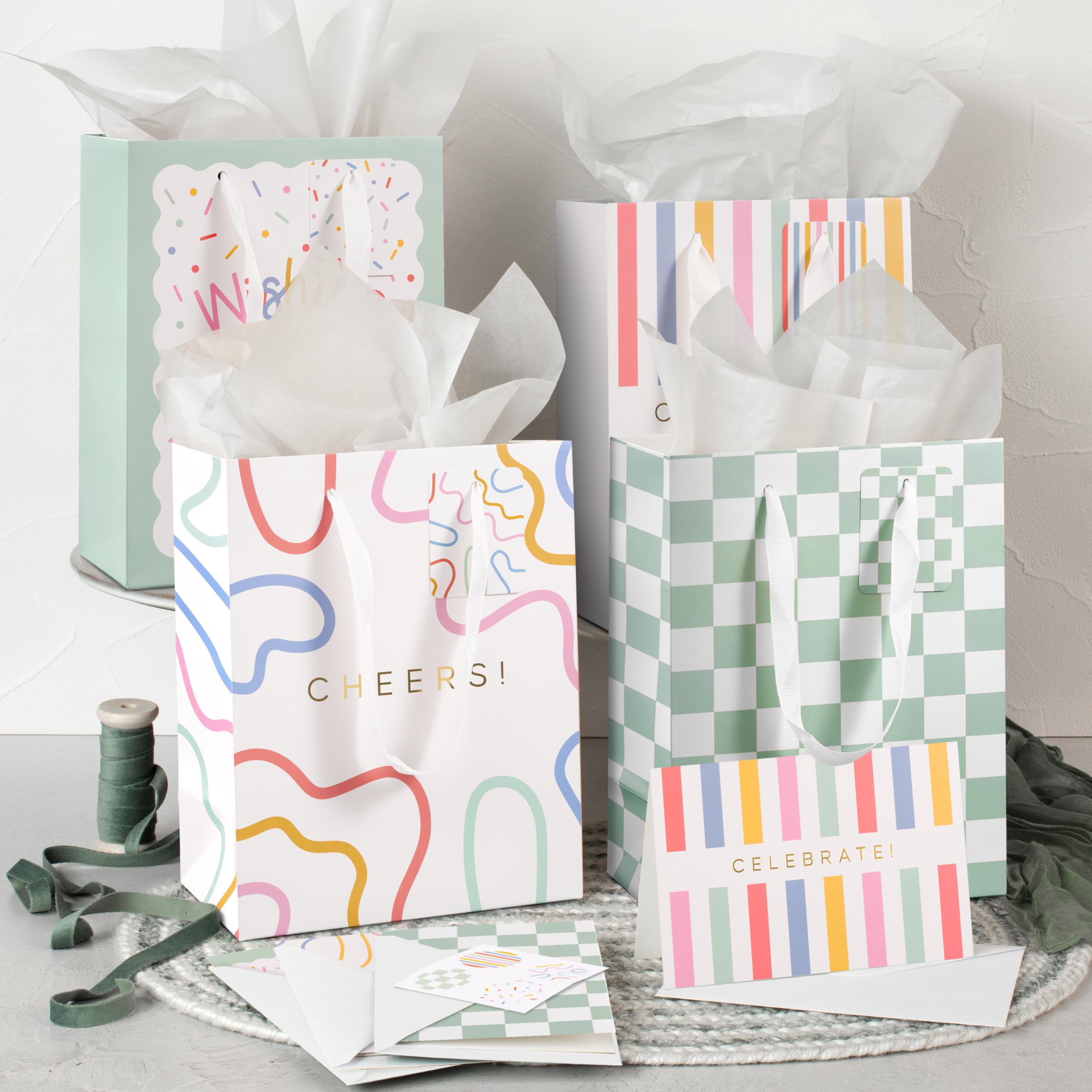 Photo 1 of Beautiful Gift Bags Set of 4 - Medium Sized 9" Bags with Handles incl. Matching Tissue Paper, Cards & Small Stickers - Reusable & For Presents of Any Birthday, Weddings, Mothers Day & Other Occasion