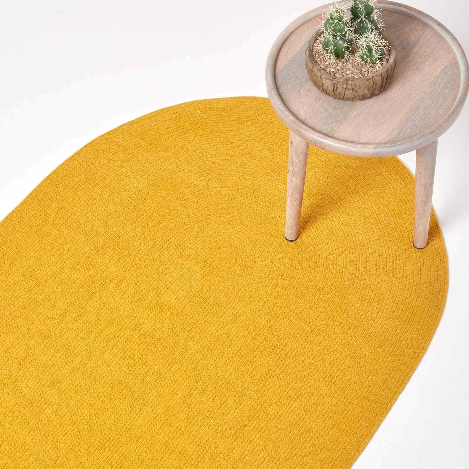 HOMESCAPES Mustard Yellow Handmade Braided Oval Rug For Bedroom & Living Room Reversible Woven Cotton Small Rug, 60 x 90 cm