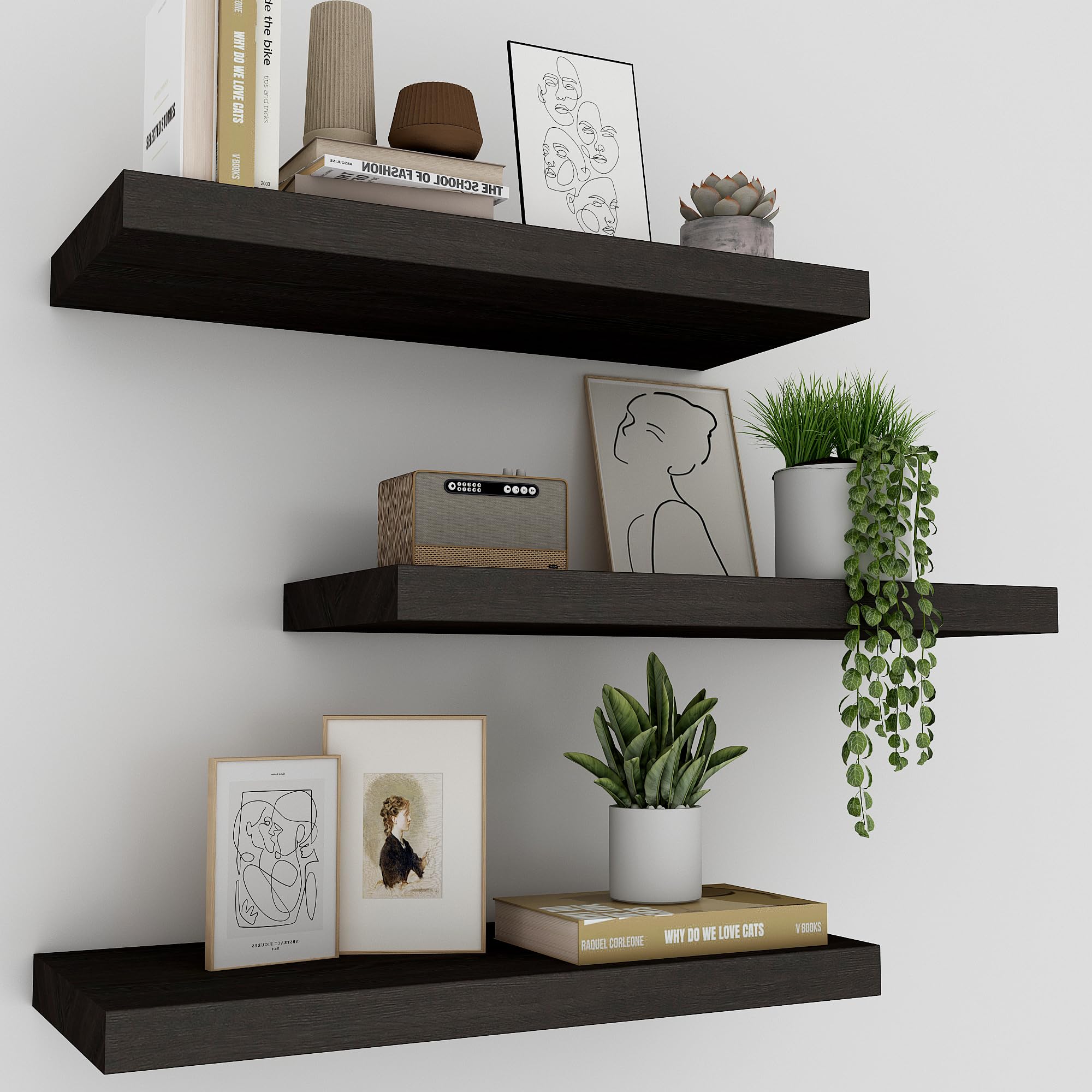 Photo 1 of Upassion Black Floating Shelves for Wall Set of 3, 16" Black Floating Shelves for Home Decor, Frame Display Wall Mounted Floating Shelf for Living Room, Bedroom, Bathroom, Kitchen