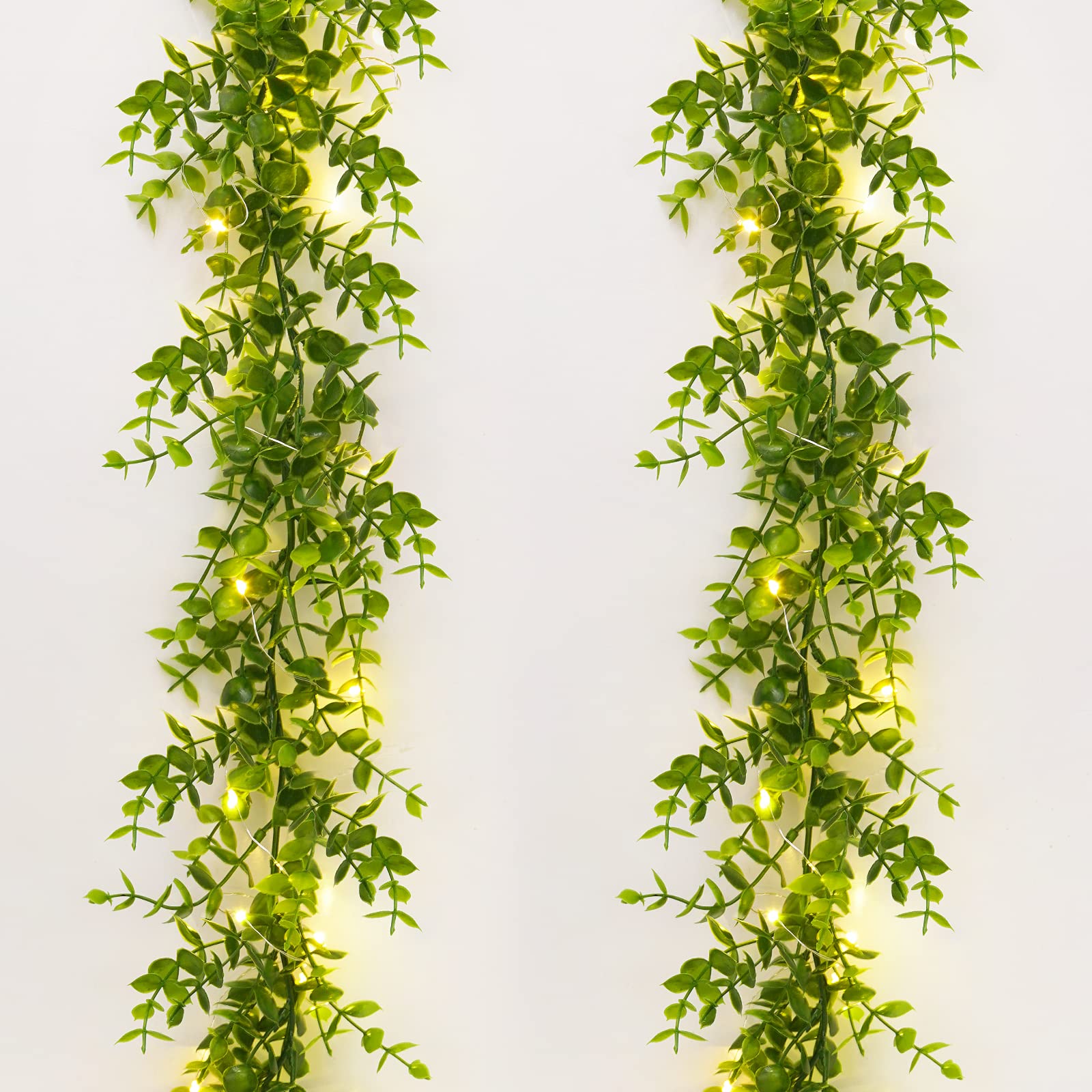 Photo 1 of Dolicer 2 Packs Eucalyptus Garland with LED Lights String, 12FT Faux Eucalyptus Greenery Garland, Artificial Hanging Green Leaves Vine Wedding Backdrop Arch Wall Table Decor (Green)