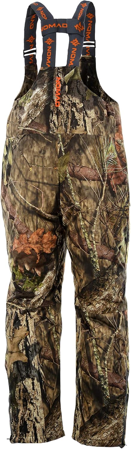 Nomad Mens Conifer Bib | Waterproof & Wind-Resistant Performance Camo Hunting Bib: Clothing
