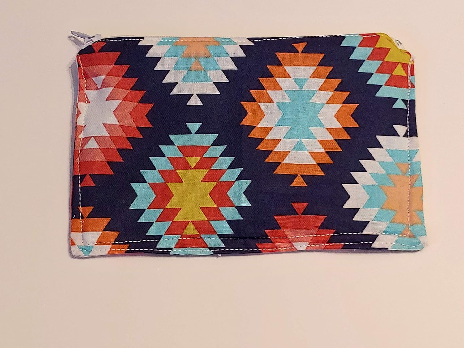 orange and blue clutch bag
