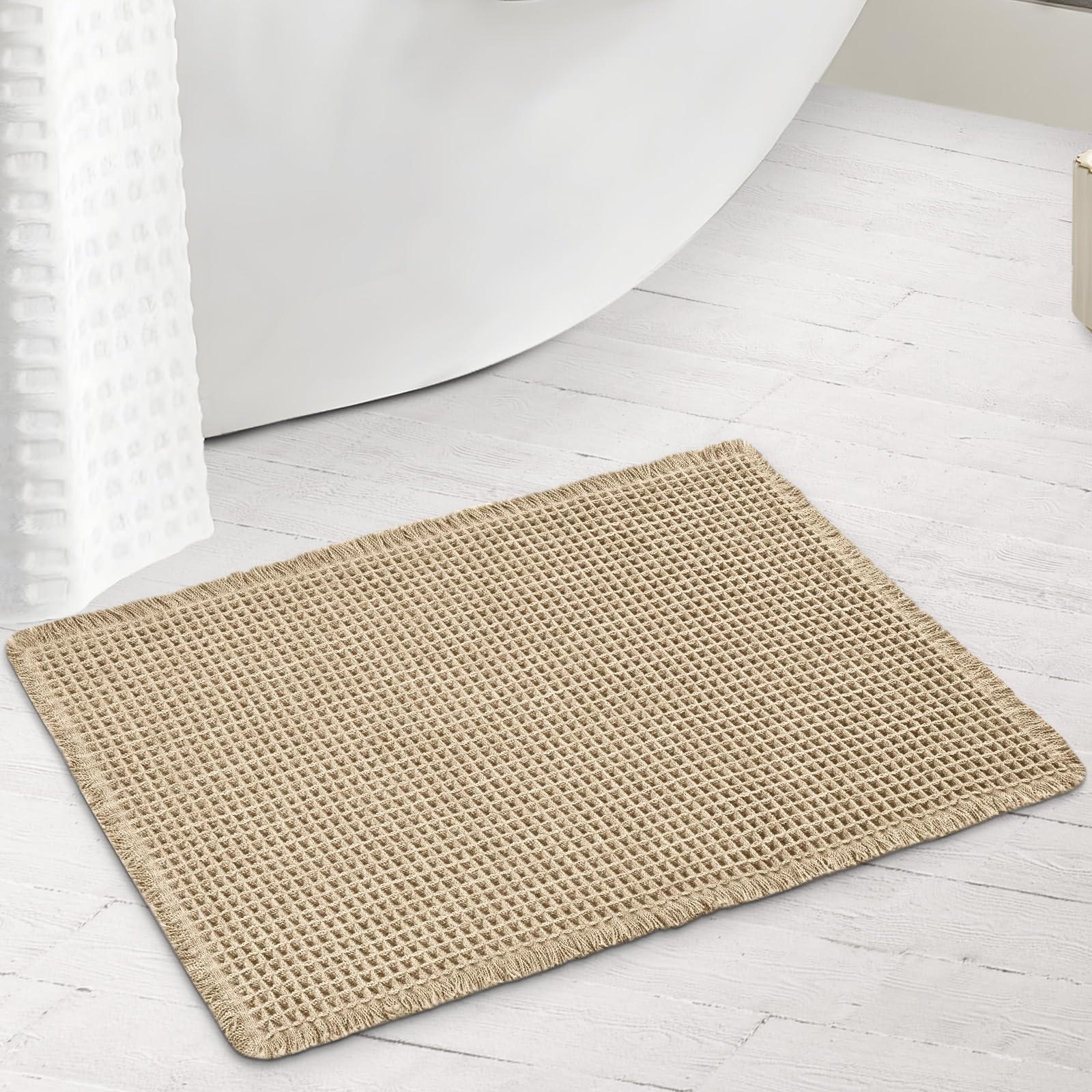 Photo 1 of Siyaluens Luxury Waffle Bath Mat, Super Absorbent Non Slip Bathroom Rugs, Boho Ultra Soft Comfort Machine Washable Quick Dry Floor Mats with Tassels (Brown, 17" x 24")