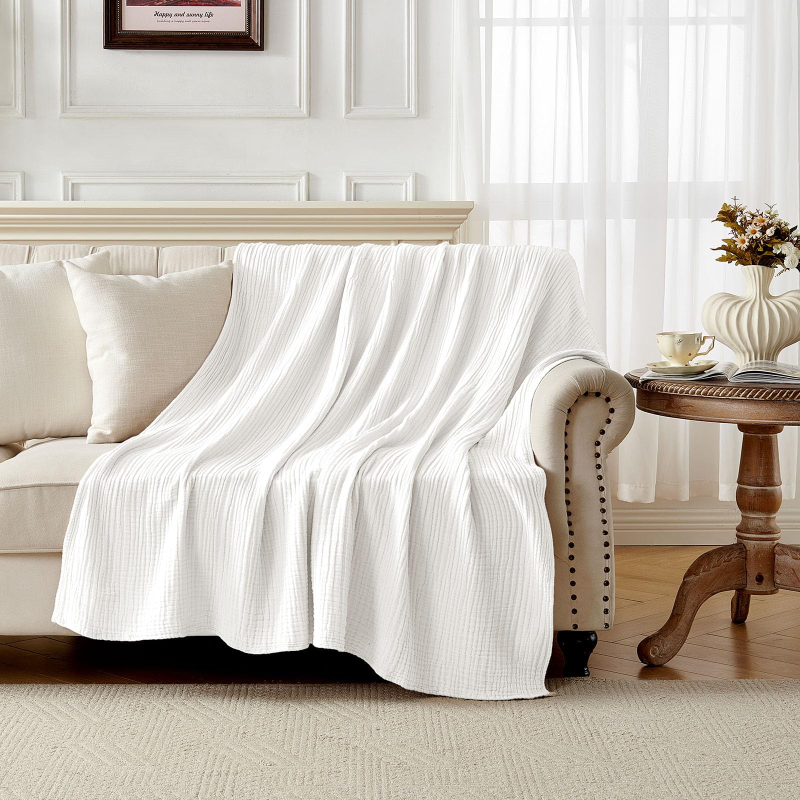 Photo 1 of Joydeco 100% Cotton Muslin Throw Blanket for Couch Bed and Sofa, 4-Layer Lightweight and Breathable Soft Gauze Blanket for All Season, Luxury Throws Cotton Blanket Gift(White, 55"x75")