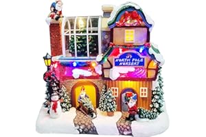 MOMENTS IN TIME Musical North Pole Nursery Christmas Village 9.3” LED Polyresin Lighted Holiday House with Santa Gnomes Snow Scene Battery Operated Tabletop Christmas Decoration