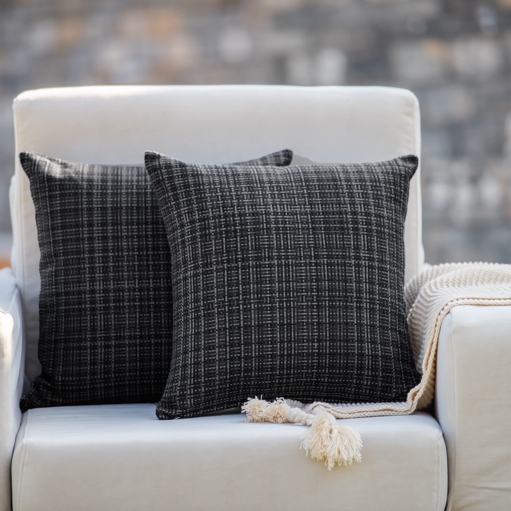 Photo 1 of HPUK Farmhouse Outdoor Waterproof Throw Pillow Covers Pack of 2, 18x18 Inch Decorative Garden Cushion Covers for Patio Tent Balcony Bench Tent Couch Sofa, Solid Accent Pillow Covers, Black