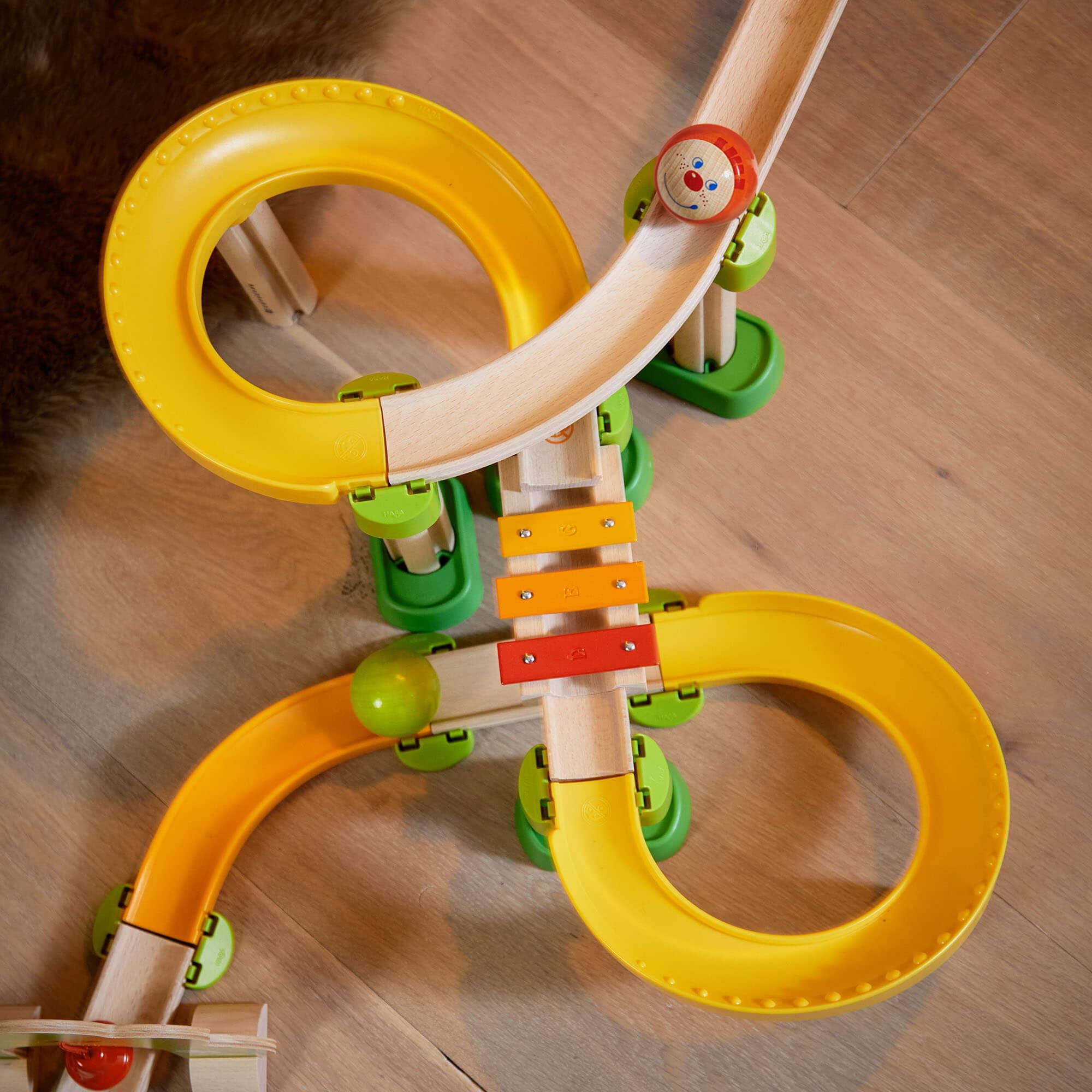 HABA Kullerbu Sim-Sala-Kling - 38 Piece Wooden & Plastic Train Track Set for Balls with Musical Effects and Domino Blocks