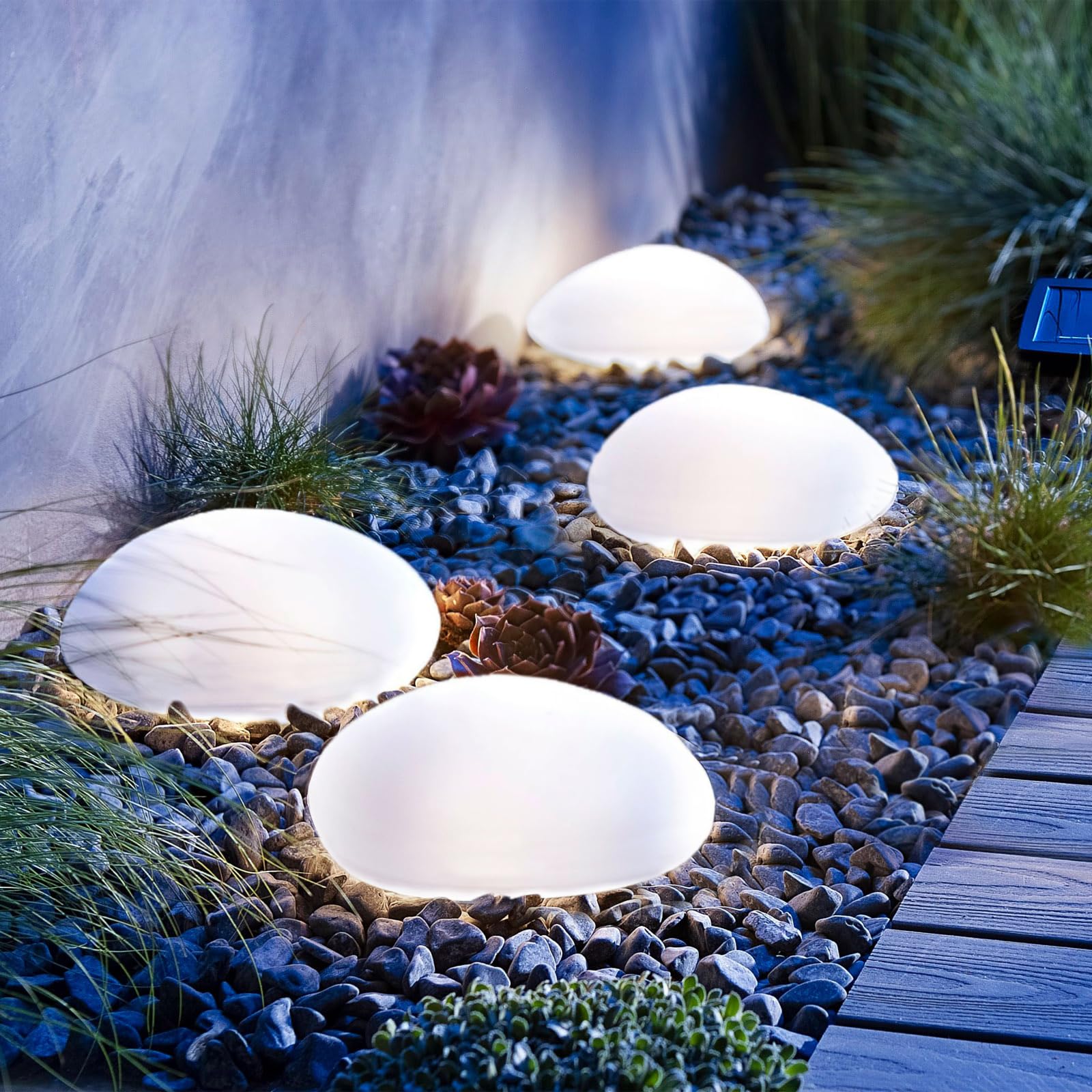 Photo 1 of SUNNYPARK Solar Garden Lights Outdoor Set of 4 Plastic Pebble Shape Decorative Rock Lights Waterproof - Cool White