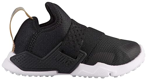 nike huarache negro con dorado